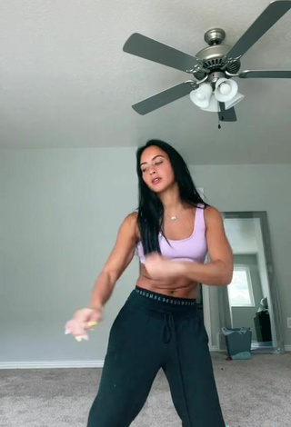 5. Sexy Gabi Butler Shows Cleavage in Violet Sport Bra