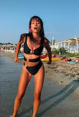 4. Sultry Giulia Penna Shows Cleavage in Black Swimsuit at the Beach (Underboob, Side Boob)