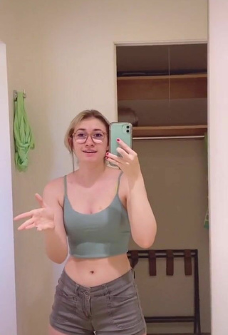 4. Sexy Sydney Shows Cleavage in Olive Crop Top