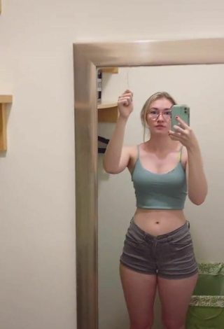 Hot Sydney Shows Cleavage in Olive Crop Top