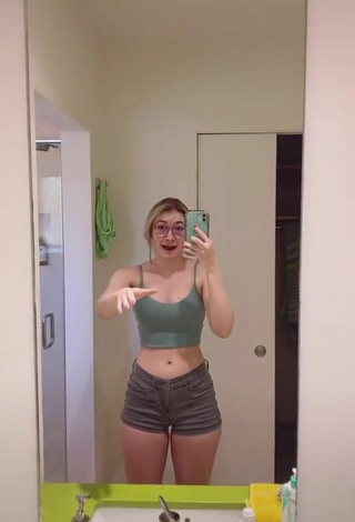 Sweetie Sydney Shows Cleavage in Olive Crop Top