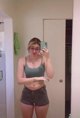 5. Sweetie Sydney Shows Cleavage in Olive Crop Top