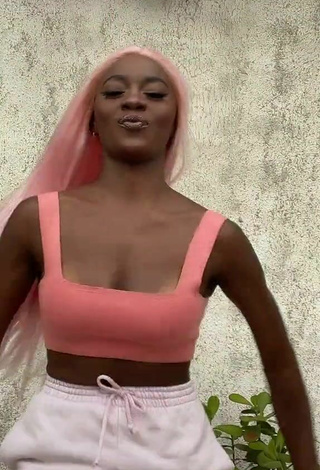 6. Luscious Mirella Qualha Shows Cleavage in Peach Crop Top