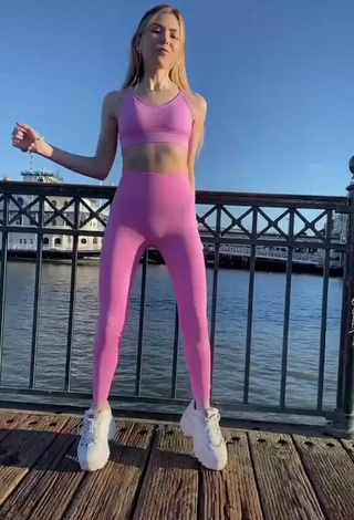 2. Sultry Bianki Place in Pink Leggings at the Seafront