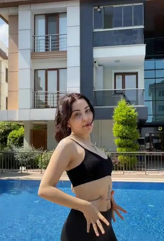 4. Sultry Zeynep Buse Korkmaz in Black Crop Top at the Pool