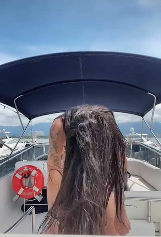 3. Sexy Pamella Fuego Shows Cleavage in Leopard Bikini on a Boat