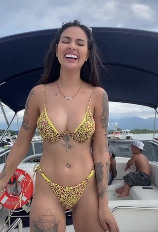 3. Beautiful Pamella Fuego Shows Cleavage in Sexy Leopard Bikini on a Boat