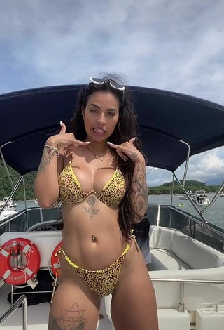 Cute Pamella Fuego Shows Cleavage in Leopard Bikini on a Boat