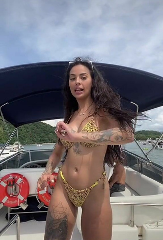 4. Cute Pamella Fuego Shows Cleavage in Leopard Bikini on a Boat