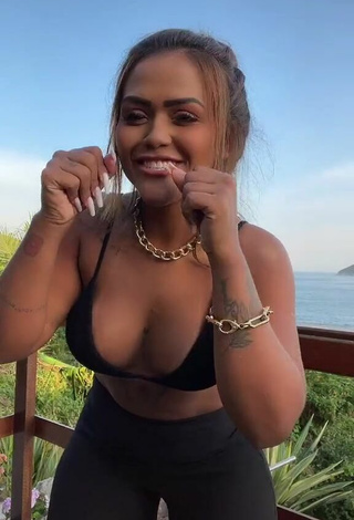 Sexy Camila De Almeida Loures Shows Cleavage in Black Bikini Top on the Balcony