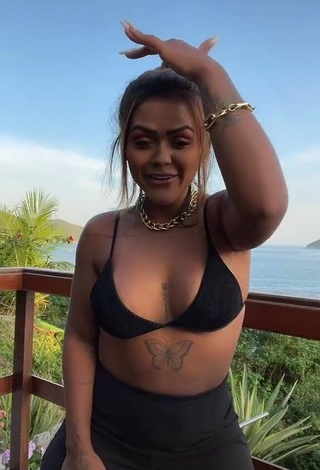 2. Sexy Camila De Almeida Loures Shows Cleavage in Black Bikini Top on the Balcony