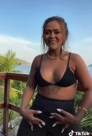 4. Sexy Camila De Almeida Loures Shows Cleavage in Black Bikini Top on the Balcony