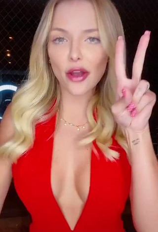 Sultry Carol Bresolin Shows Cleavage in Red Top