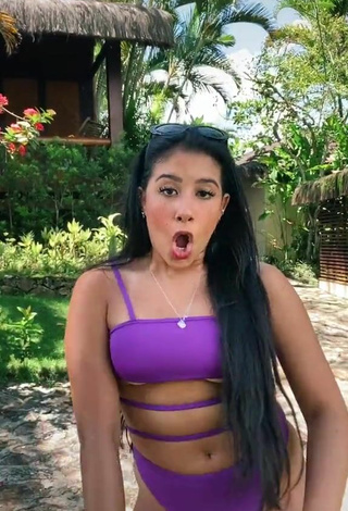 2. Sultry Cinthia Cruz in Violet Swimsuit (Underboob)