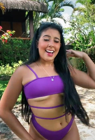 3. Sultry Cinthia Cruz in Violet Swimsuit (Underboob)