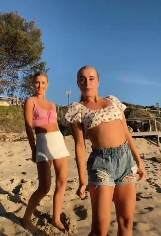 3. Beautiful Caitlin Cummins in Sexy Pink Crop Top at the Beach