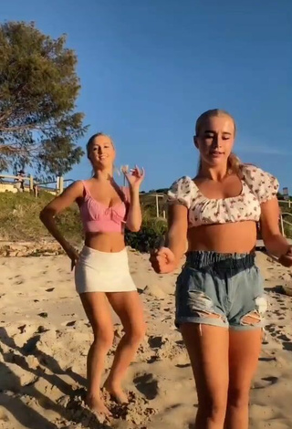 4. Beautiful Caitlin Cummins in Sexy Pink Crop Top at the Beach