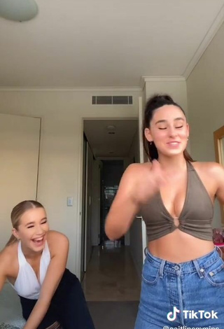 3. Titillating Caitlin Cummins Shows Cleavage in Olive Crop Top