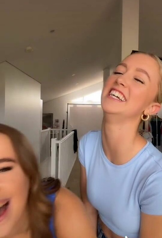 2. Sexy Caitlin Cummins Shows Cleavage in Blue Crop Top