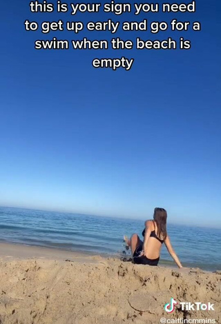 3. Sexy Caitlin Cummins in Black Bikini Top at the Beach