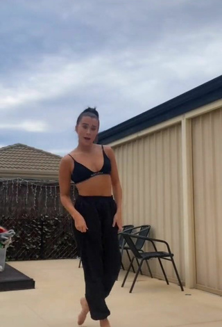 Sultry Caitlin Cummins in Black Sport Bra