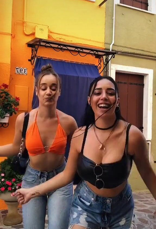 4. Cute Carla Flila Shows Cleavage in Orange Crop Top