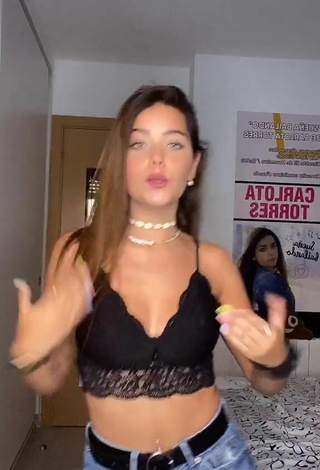 4. Titillating Carlota Torres Shows Cleavage in Black Crop Top