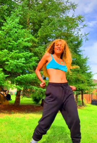 4. Hot Cassidy J in Turquoise Crop Top