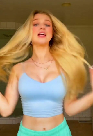 2. Luscious Charli Elise Shows Cleavage in Blue Crop Top