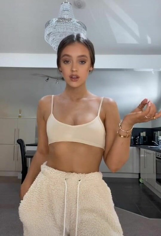 3. Sultry Chloe Rose in Beige Crop Top