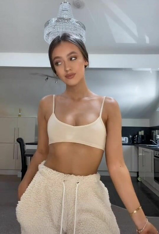 5. Sultry Chloe Rose in Beige Crop Top