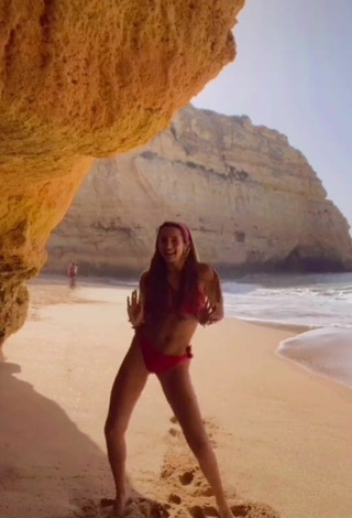 4. Luscious Constanza Ariza in Red Bikini at the Beach