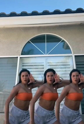 Sultry Devin Ramirez in Orange Tube Top