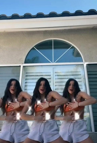 3. Sultry Devin Ramirez in Orange Tube Top