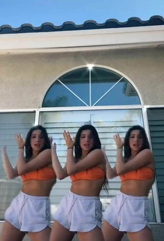 4. Sultry Devin Ramirez in Orange Tube Top