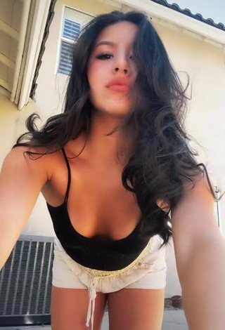 Cute Devin Ramirez Shows Cleavage in Black Crop Top