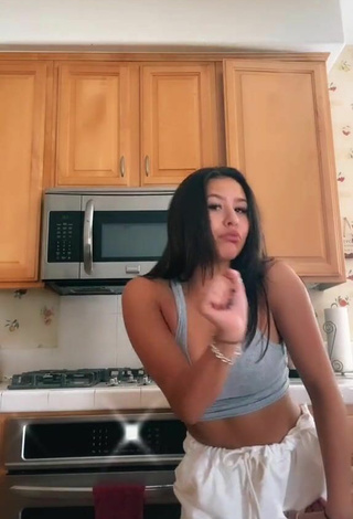 2. Titillating Devin Ramirez Shows Cleavage in Grey Crop Top