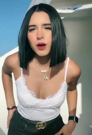 Sultry Dominik Elizabeth Reséndez Robledo Shows Cleavage in White Top