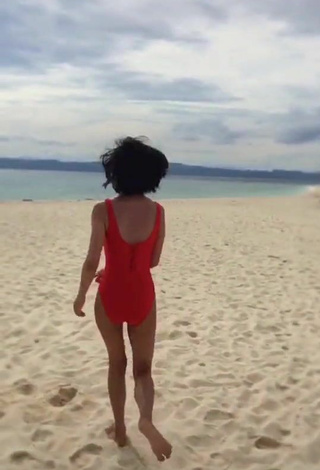 1. Sultry Edina Enriquez in Red Swimsuit at the Beach