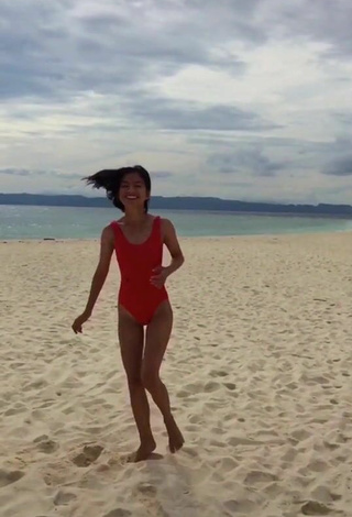 2. Sultry Edina Enriquez in Red Swimsuit at the Beach