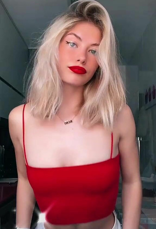 2. Sweet Iryna Zubkova Shows Cleavage in Cute Red Crop Top