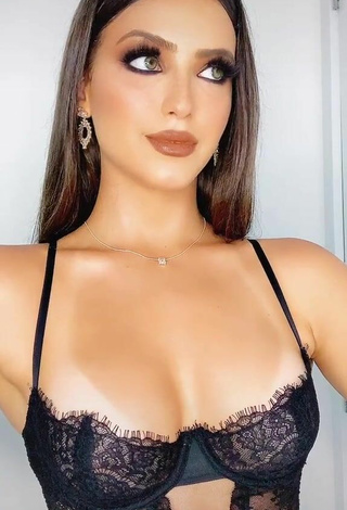 Luscious Isa Pinheiro Shows Cleavage in Black Lingerie