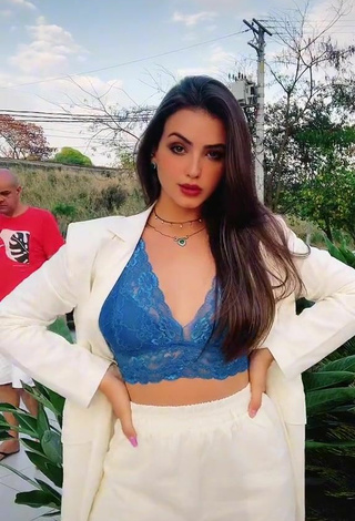 Sultry Isa Pinheiro Shows Cleavage in Blue Bra in a Street