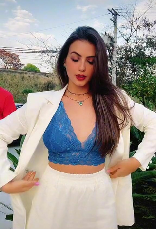 2. Sultry Isa Pinheiro Shows Cleavage in Blue Bra in a Street