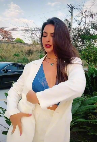 3. Sultry Isa Pinheiro Shows Cleavage in Blue Bra in a Street