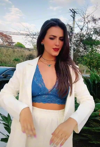 5. Sultry Isa Pinheiro Shows Cleavage in Blue Bra in a Street