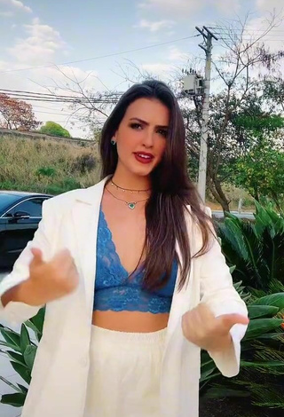 6. Sultry Isa Pinheiro Shows Cleavage in Blue Bra in a Street