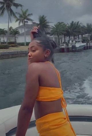 4. Sultry Gabby Morrison in Yellow Bikini Top on a Boat