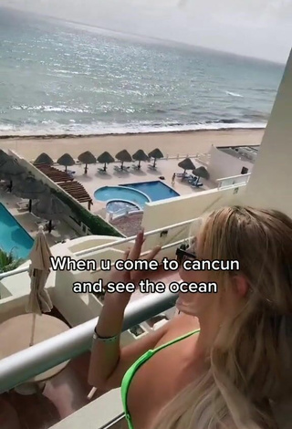 5. Sweetie Gemajae in Lime Green Bikini on the Balcony