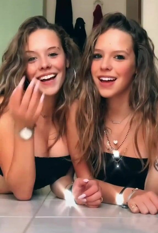 2. Sultry Greta & Alice Greali Shows Cleavage in Black Tube Top